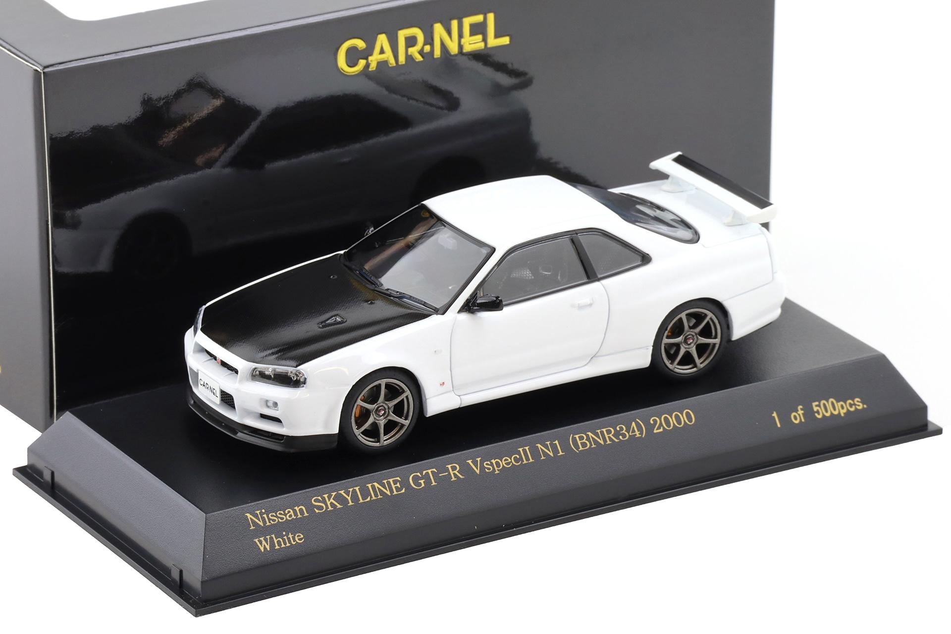 ID 110038 orig.jpg 1:43 CAR-NEL by Kyosho Nissan Skyline GT-R (R34) V-SPEC N1 2000 white/ Carbon